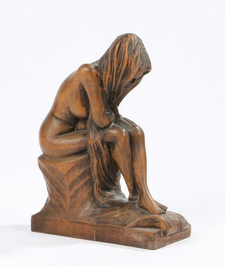 Carved wooden figure, depicting a seated female nude