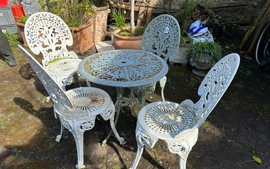 Cast iron garden table and 4 chairs (heavy)