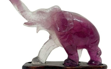Chinese statuette depicting transparent amethyst