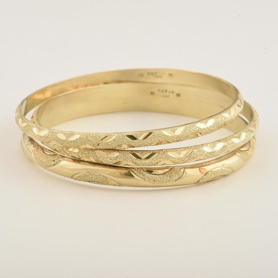 Collection of Three 14k Yellow Gold Bangle Bracelets.