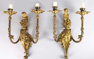 Coppia di applique a due fiamme in bronzo dorato