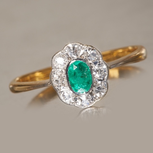EMERALD AND DIAMOND CLUSTER RING, High carat gold. Vibrant e...