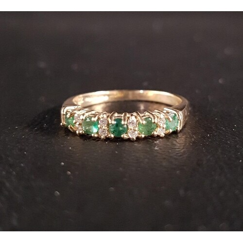 EMERALD AND DIAMOND RING the five emeralds separated by smal...