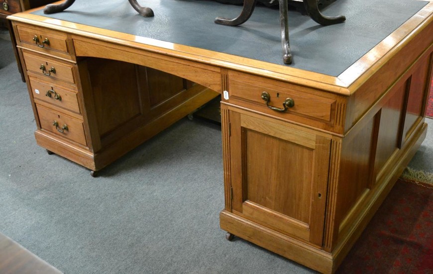 Early 20th century mahogany partner's desk, with brass locks stamped...