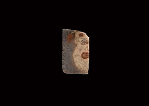Egyptian Glass Fragment with Comic Face