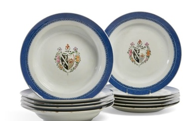 Eleven Chinese Export armorial bowls and plates