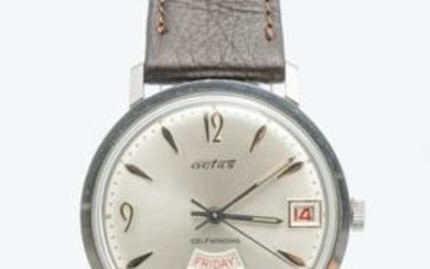 Elgin Octus Day-Date, 60s Stainless steel round case. Argenté dial,...