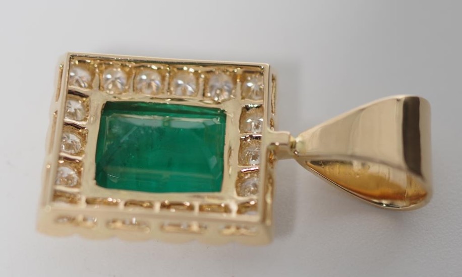 Emerald and diamond set 18ct yellow gold pendant approx 1x e...