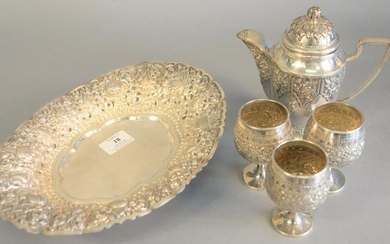 Five Djokja silver pieces to include a teapot, ht. 7"