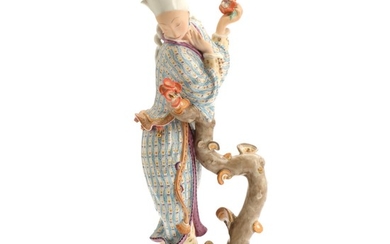 Gerhard Henning: “Moon girl”. A Royal Copenhagen porcelain figurine, decorated in colours and gold. Signed monogram. H. 30 cm.