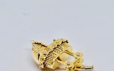 Gold and diamond brooch signed "La Cloche"