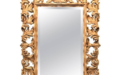 Heavily Carved French Frame Flanking a Bevelled Glass Wall or Console Mirror