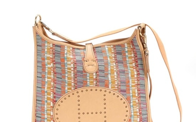 NOT SOLD. Hermès: A "Evelyne" bag of light brown leather and multi coloured canvas with gold tone hardware. – Bruun Rasmussen Auctioneers of Fine Art