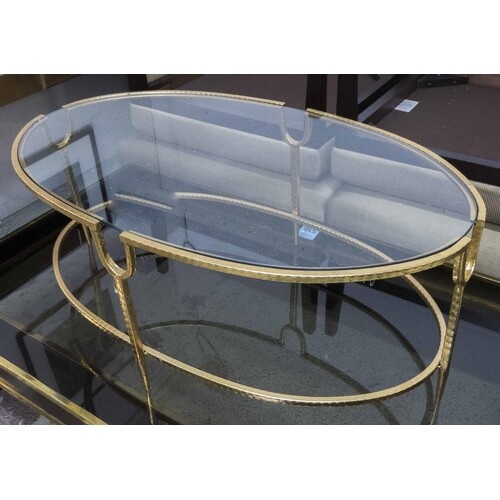 LOW TABLE, Maison Jansen style, gilt metal with oval glass t...