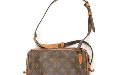 NOT SOLD. Louis Vuitton: A "Marly Bandouliere" bag made of brown monogram canvas with brown...