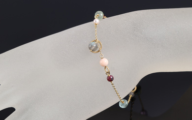 Marianne Dulong. 'Piccolo Daybreak' bracelet in 18 kt. gold with gemstones