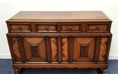 OAK AND WALNUT SIDEBOARD with two panelled frieze drawers ab...