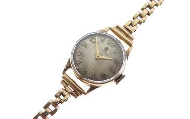 Omega - Lady's 9ct gold wristwatch, circular Arabic dial,...