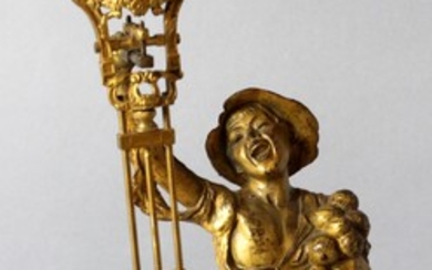 Orologio in bronzo dorato sorretto da fanciullo, altezza 34,5 cm, primi '900, (da revisionare).