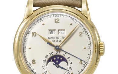 PATEK PHILIPPE. AN EXTREMELY RARE AND ELEGANT 18K GOLD PERPETUAL...
