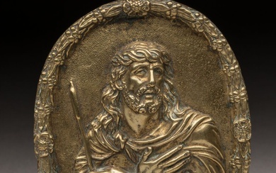 PLAQUE en bronze doré de forme ovale à décor en haut-relief d'un Christ au roseau,...