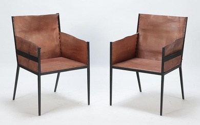 Pair Iron and tailored leather Arm Chairs in the manner of Jean-Michel Frank. Ht: 35.75" Wd: 23.75"