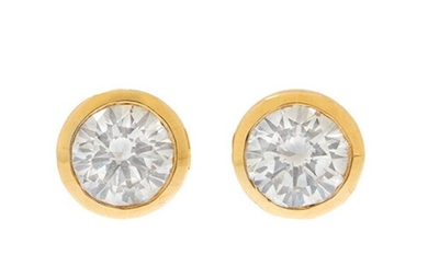 Pair of 18k yellow gold earrings. With central diamonds total weight ca. 0.75 cts.