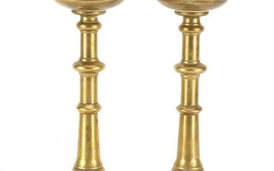 Pair of antique continental bronze candlesticks, each