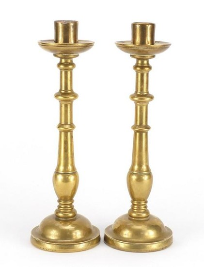 Pair of antique continental bronze candlesticks, each