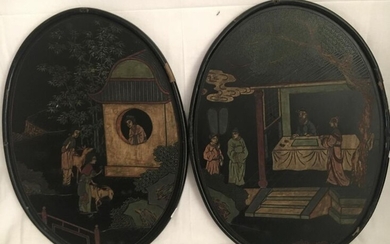 Pair of oval panels in sinabra lacquer, representing...