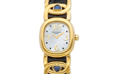 Patek Philippe Golden Ellipse, Reference 4833 | A yellow gold and sapphire-set wristwatch with mother-of-pearl dial, Circa 1995 | 百達翡麗 | Golden Ellipse 型號4833 | 黃金鑲藍寶石腕錶，備珠母貝錶盤，約1995年製