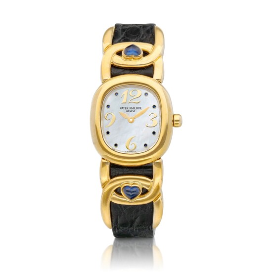 Patek Philippe Golden Ellipse, Reference 4833 | A yellow gold and sapphire-set wristwatch with mother-of-pearl dial, Circa 1995 | 百達翡麗 | Golden Ellipse 型號4833 | 黃金鑲藍寶石腕錶，備珠母貝錶盤，約1995年製