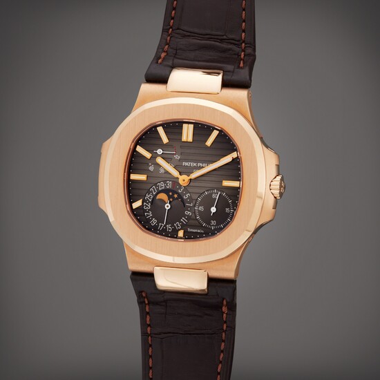 Patek Philippe Reference 5712R-001 Nautilus | Retailed by Tiffany & Co.: A pink gold automatic wristwatch with date, moon phases, and power reserve indication, Circa 2018