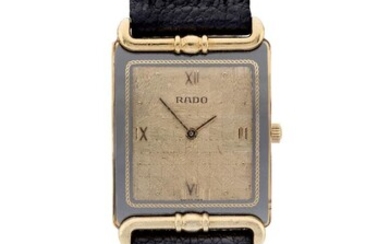 Rado. An 18ct gold quartz rectangular wristwatch Ref. 153.8120.6, Case Number 3059050, c. 1990 Quartz movement, textured champagne dial with applied Roman quarters, rectangular gold case, the back held by 4 screws, fixed integral decorative lugs...