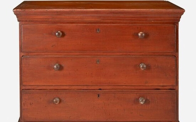 Red-painted chest of drawers with scalloped apron