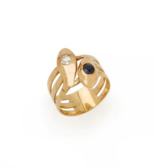 Ring Snakes in 18K (750/°°) yellow gold, forming three rings, the heads of the reptiles adorned with a sapphire and a diamond. TDD: 62 Gross weight: 9.8g