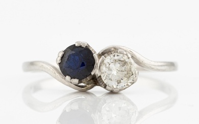 Ring, sibling ring, platinum with brilliant-cut diamond and dark sapphire