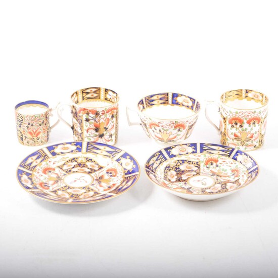 Royal Crown Derby, Imari pattern trio and three coffee cans