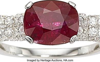 Ruby, Diamond, White Gold Ring Stones: Cushion-shaped ruby weighing...