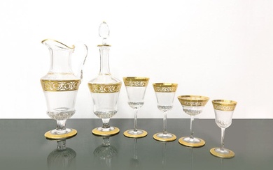 Saint Louis © (Francia, 1586) Set of 48 glasses and bottles, 'THISTLE GOLD' decoration, 20th century