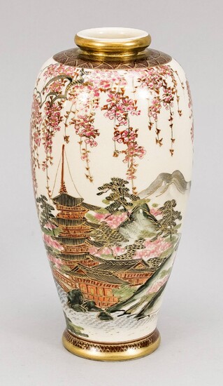 Satsuma vase, Japan, mid-20th century. Shouldered shape with all-round landscape vase using plenty of gold. Flowering branches hang down from above. Under the floor a mark with gold on a brown rectangle, h. 22 cm