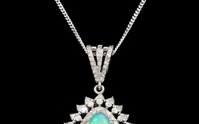 Silver pear cut opal and round brilliant cut diamond cluster pendant necklace