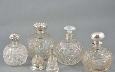 Six cut-glass cologne and scent bottles.