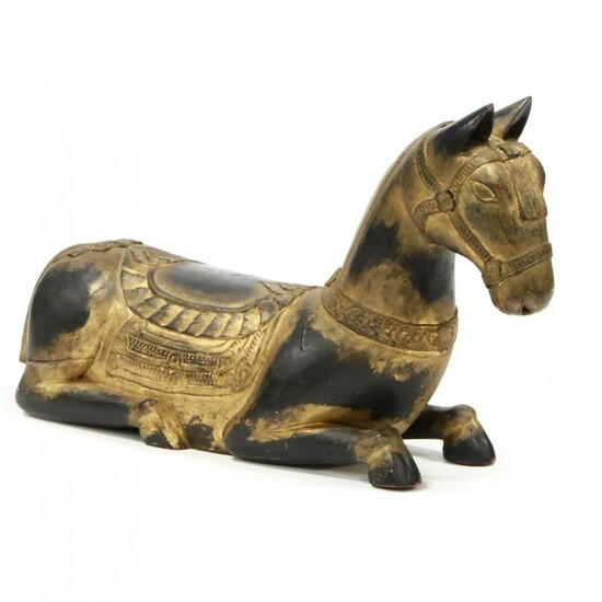 Southeast Asian Carved and Parcel Gilt Recumbent Horse