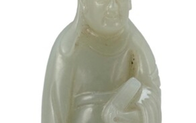 CELADON JADE CARVING OF A MANCHU OFFICIAL Late...