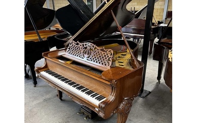 Steinway (c1912) A 5ft 10in Model O grand piano in a carved ...