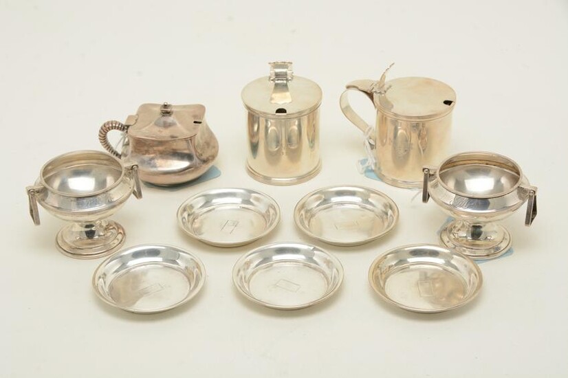 Sterling silver mustard pots and salt cellars. Includes