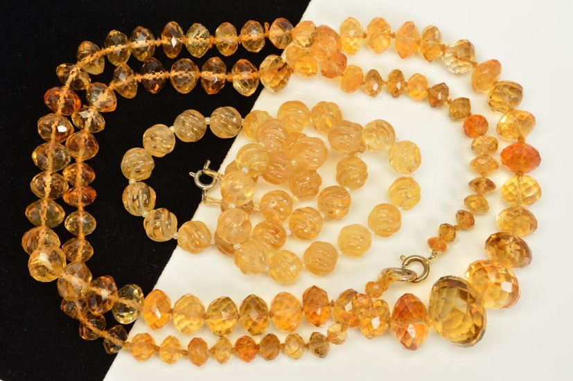 TWO CITRINE BEAD NECKLACES, the first designed as a uniform ...
