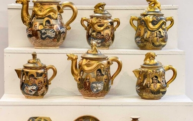 A group of early 20th century Japanese satsuma teapots,...