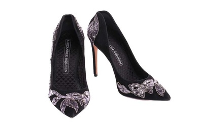 Three pairs of shoes; a pair of Alexander McQueen pointed-toe high heels in black suede with silver